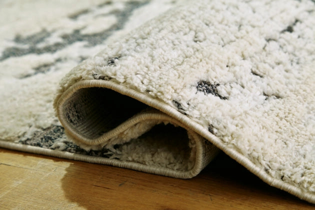 Addylin 7'10" x 9'10" Rug - Furniture Story