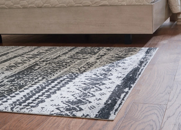 Devman 5'2" x 6'10" Rug - Furniture Story