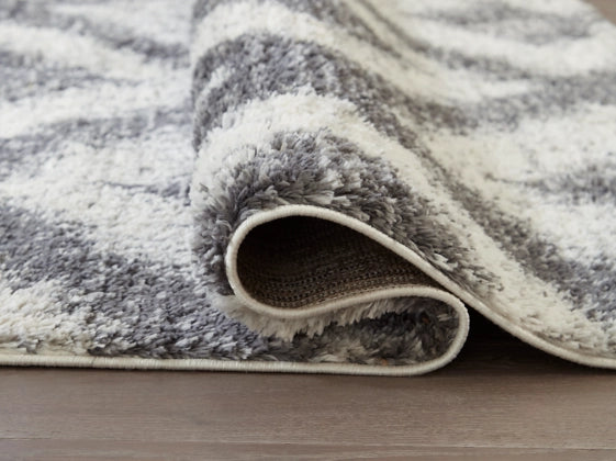 Junette 7'10" x 10' Rug - Furniture Story