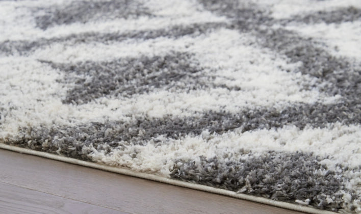 Junette 7'10" x 10' Rug - Furniture Story