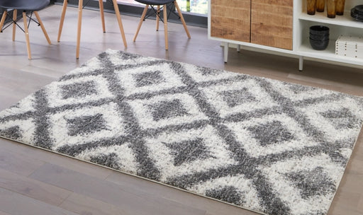 Junette 7'10" x 10' Rug - Furniture Story