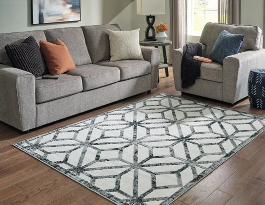 Reidland 7'10" x 9'10" Rug - Furniture Story