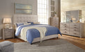 Dolante Queen Upholstered Bed - Furniture Story