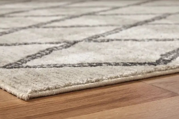 Jarmo 5' x 7' Rug - Furniture Story