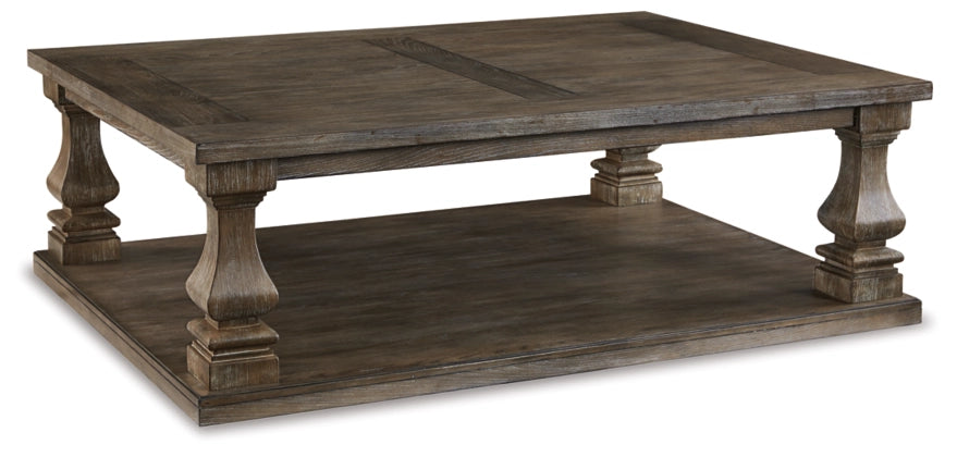 Johnelle Coffee Table - Furniture Story