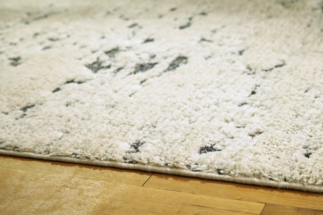 Addylin 7'10" x 9'10" Rug - Furniture Story