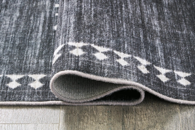 Arloman 7'5" x 9'6" Rug - Furniture Story