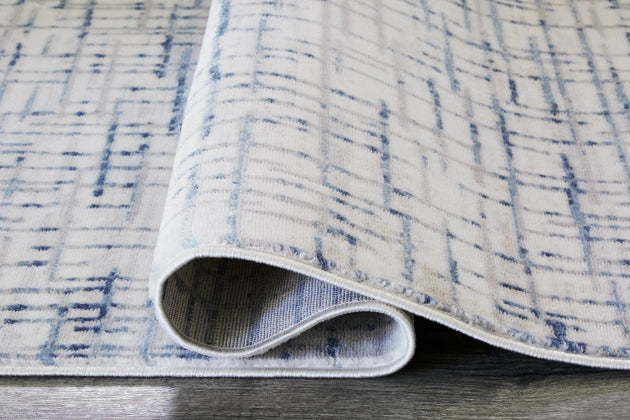 Beckfille 8' x 10' Rug - Furniture Story