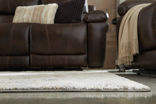 Wyscott 7'10" x 10'3" Rug - Furniture Story