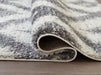 Junette 7'10" x 10' Rug - Furniture Story