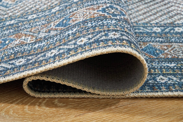 Landler 7'7" x 10'1" Rug - Furniture Story