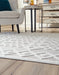 Larkton 7'10" x 9'10" Rug - Furniture Story
