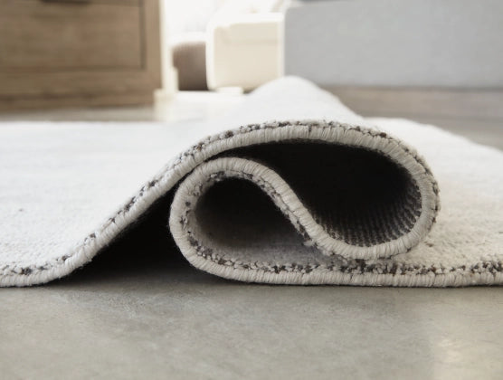 Lenlett 7'8" x 10' Rug - Furniture Story