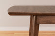 Lyncott Dining Extension Table - Furniture Story