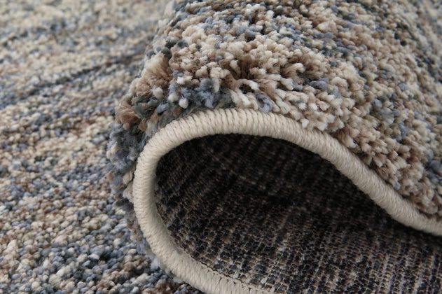 Marnin 7'10" x 10' Rug - Furniture Story