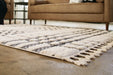Oladon 5'3" x 7'3" Rug - Furniture Story