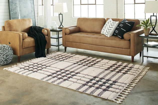 Oladon 5'3" x 7'3" Rug - Furniture Story