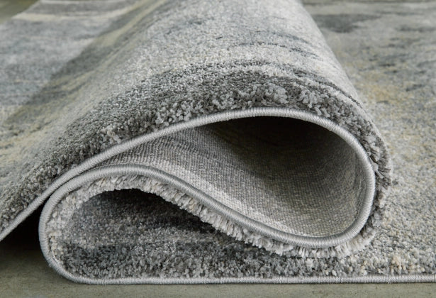 Larobin 7'10" x 10'6" Rug - Furniture Story