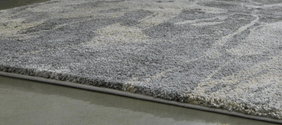 Larobin 5'3" x 7'3" Rug - Furniture Story