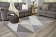 Toksook 7'10" x 10'6" Rug - Furniture Story