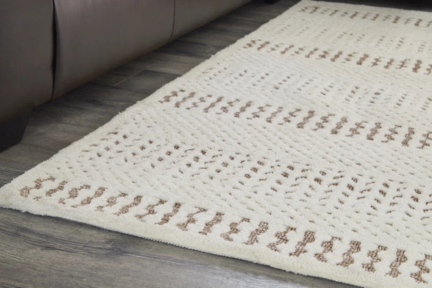 Vallcherr 7'8" x 10' Rug - Furniture Story