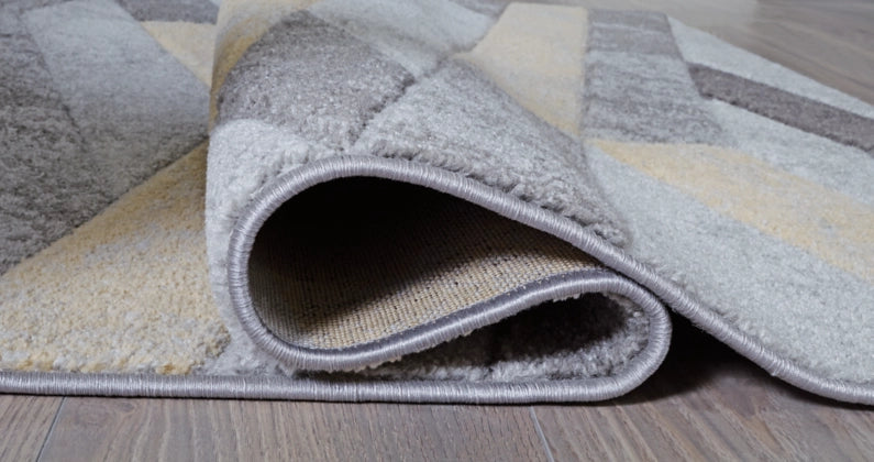 Wittson 7'5" x 9'6" Rug - Furniture Story