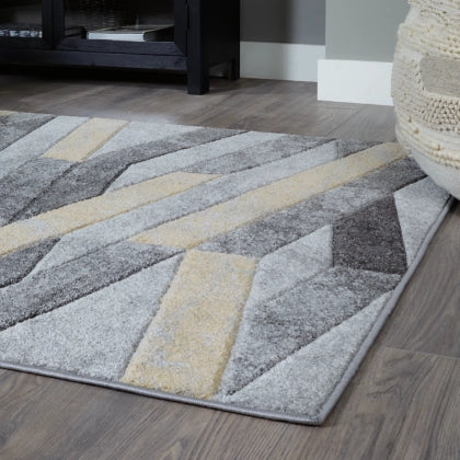 Wittson 7'5" x 9'6" Rug - Furniture Story