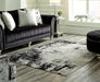 Zekeman 7'10" x 10' Rug - Furniture Story