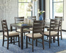 Rokane Dining Table and Chairs (Set of 7) - Furniture Story